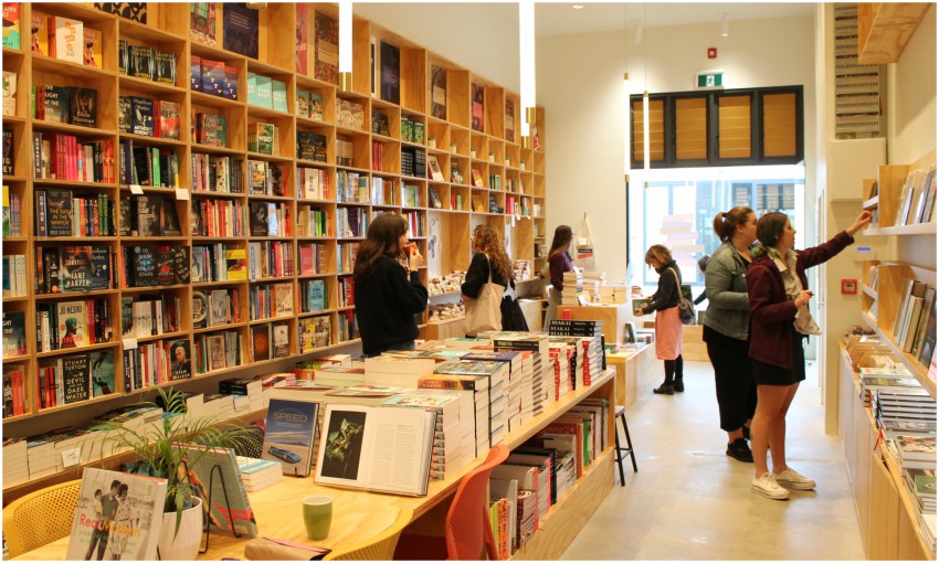 Interior of a bookstore, with customers