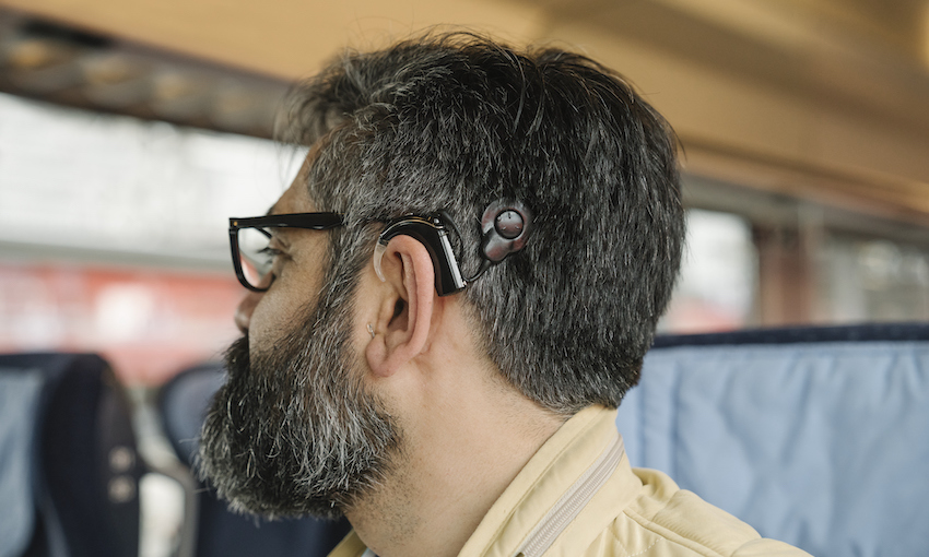 Man with cochlear implant