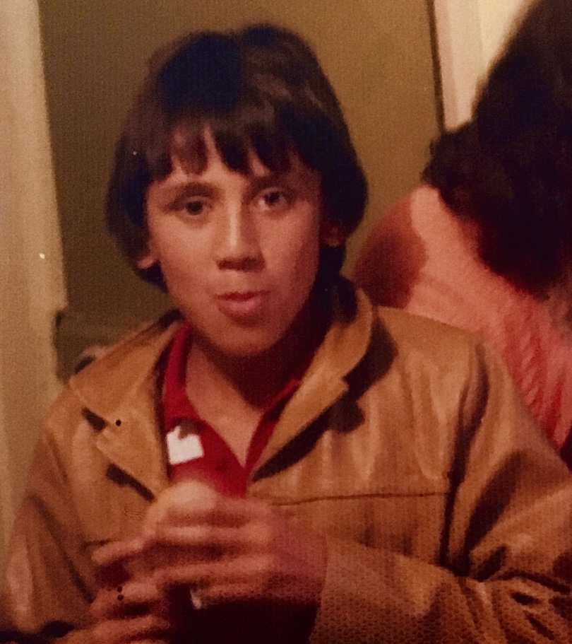 Old family photo of a boy aged approx 12? in an awesome tan leather jacket.